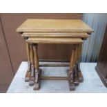 SMALL OAK NEST OF THREE TABLES