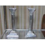 PAIR OF SILVER PLATED COLUMN FORM CANDLESTICKS,