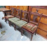 SET OF FOUR CARVED MAHOGANY DINING CHAIRS