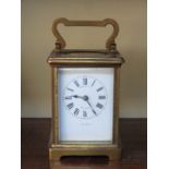 BRASS FRENCH STYLE CARRIAGE CLOCK WITH ENAMELLED DIAL