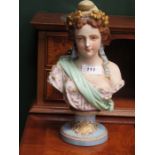 HANDPAINTED AND GILDED UNGLAZED CERAMIC BUST,