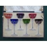 CASED SET OF SIX MULTI-COLOURED STEMMED DRINKING GLASSES