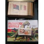 ALBUM OF POSTAGE STAMPS AND VARIOUS CIGARETTE CARDS INCLUDING KENSITAS SILKS