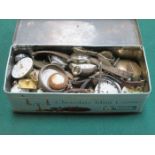 TIN CONTAINING WATCH PARTS AND ACCESSORIES