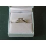 18ct WHITE GOLD LADIES DRESS RING SET WITH PRINCESS AND BAGUETTE CUT DIAMONDS FLANKED BY SIX