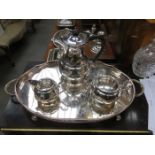 WALKER & HALL SILVER PLATED THREE PIECE TEASET ON OVAL PLATED TRAY