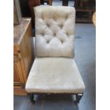 EBONISED LOW SEATED BUTTON BACK NURSING CHAIR