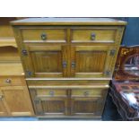 PAIR OF OAK PRIORY STYLE SIDE CABINETS