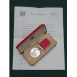 CASED ORDER OF THE BRITISH EMPIRE MEDAL WITH ACCOMPANYING LETTERS,