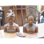 PAIR OF CARVED MIDDLE EASTERN/INDONESIAN STYLE TREEN BUSTS,