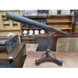 ANTIQUE BRASS TELESCOPE ON TRIPOD SUPPORTS,