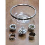 HALLMARKED SILVER RIMMED GLASS FRUIT BOWL, MUSTARD POT AND NAPKIN RINGS, ETC.
