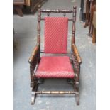 VICTORIAN MAHOGANY SMALL UPHOLSTERED AMERICAN ROCKING CHAIR