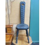 CARVED EBONISED SPINNING CHAIR