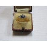 UNHALLMARKED YELLOW METAL DRESS RING SET WITH SAPPHIRES AND BLUE COLOURED STONES