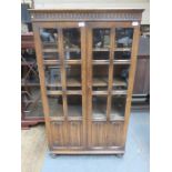 PRIORY STYLE OAK TWO DOOR GLAZED BOOKCASE