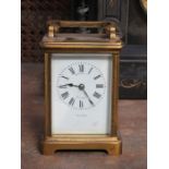 BRASS FRENCH STYLE CARRIAGE CLOCK WITH ENAMELLED DIAL