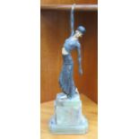 ART DECO BRONZE EFFECT AND IVORY COLOURED FIGURINE ON ONYX SUPPORT, IN THE LORENZL MANNER,