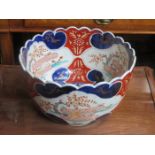 HANDPAINTED AND GILDED ORIENTAL AND WAVE EDGED DEEP BOWL, DECORATED IN THE IMARI PALETTE,