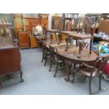 MAHOGANY EXTENDING TABLE ON BALL AND CLAW SUPPORTS,