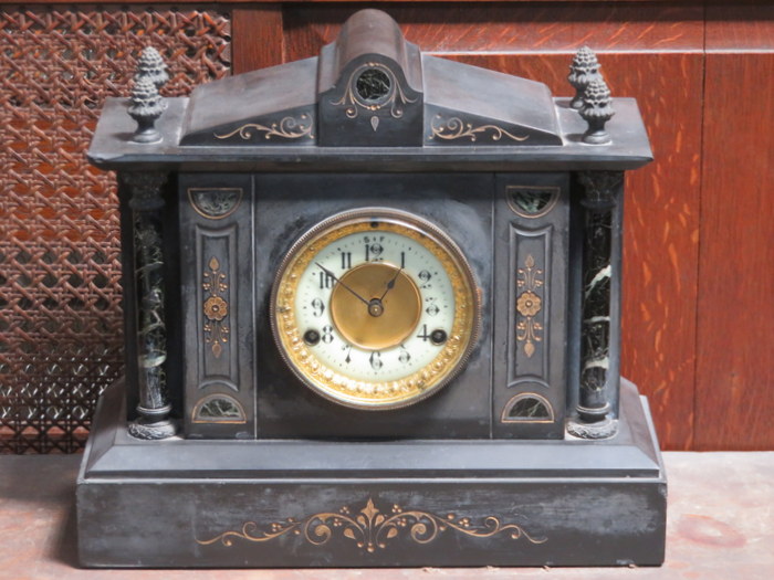 DECORATIVE BLACK SLATE MANTLE CLOCK WITH GILDED & ENAMELLED DIAL