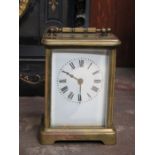 BRASS AND GLASS CASED FRENCH STYLE BRACKET CLOCK