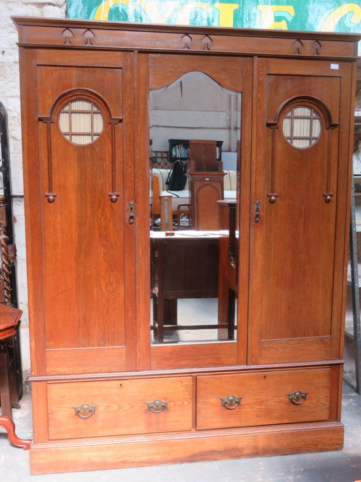 NICE QUALITY OAK ARTS & CRAFTS TWO DOOR MIRRORED AND GLAZED FRONTED WARDROBE