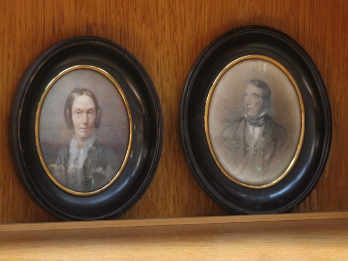 TWO HANDPAINTED OVAL MINIATURE PORTRAITS WITHIN OVAL FRAMES