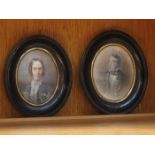 TWO HANDPAINTED OVAL MINIATURE PORTRAITS WITHIN OVAL FRAMES