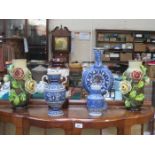 PAIR OF RELIEF FLORAL VASES,