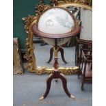 REPRODUCTION GLOBE ON GILDED REPRODUCTION TRIPOD STAND