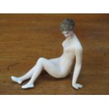 SMALL UNGLAZED GERMAN STYLE HANDPAINTED RECLINING NUDE FIGURE