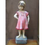 PAINTED POTTERY FIGURE, STAMPED COUNTRY CORNER No.