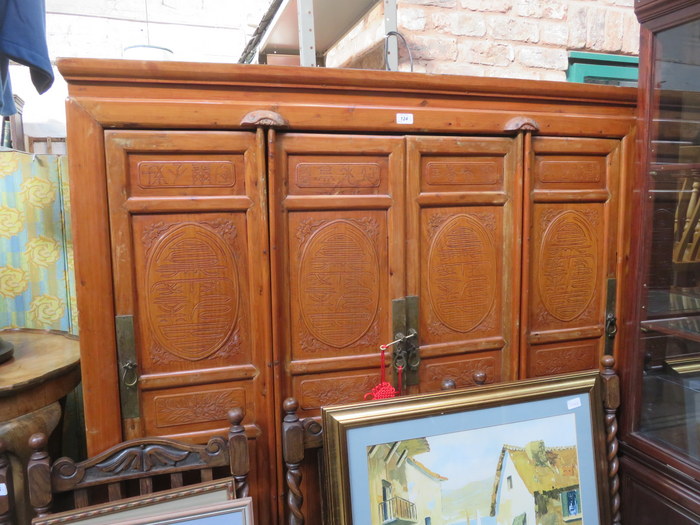 DECORATIVE CARVED FRONTED CHINESE FOUR DOOR CUPBOARD