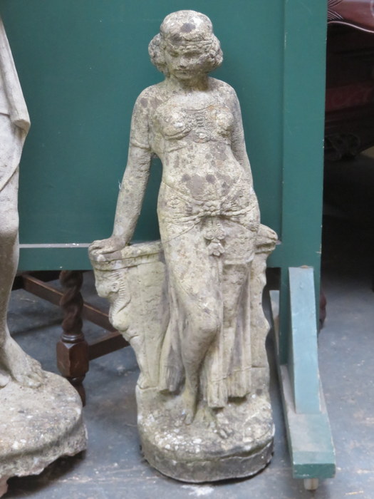 STONEWARE GARDEN ORNAMENT OF A RECLINING LADY,