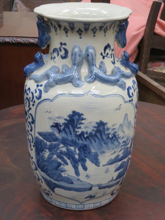 CHINESE RELIEF DECORATED BLUE AND WHITE CERAMIC VASE,