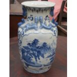 CHINESE RELIEF DECORATED BLUE AND WHITE CERAMIC VASE,