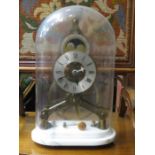 BRASS SKELETON CLOCK UNDER GLASS DOME ON MARBLE BASE