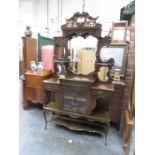 VICTORIAN HEAVILY CARVED AND PIERCEWORK DECORATED MIRRORBACK CHIFFONIER