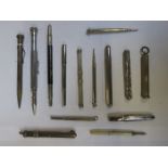 VARIOUS SILVER COLOURED PROPELLING PENCILS ETC.