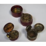 TWO CIRCULAR AND ONE VICTORIAN/EDWARDIAN TRAVELLING INKWELLS