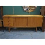 GORDON RUSSELL TEAK 1970s STYLE SIDEBOARD WITH THREE DRAWERS AND SLIDING DOORS