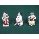 THREE VARIOUS HANDPAINTED CONTINENTAL STYLE MUSICIAN FIGURES