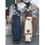 TWO SETS OF GOLF CLUBS IN BAGS