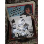 SMALL CASE CONTAINING MICHAEL JACKSON NEWSPAPERS,