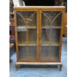 WALNUT VENEERED TWO DOOR DISPLAY CABINET