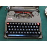 CASED EMPIRE DELUXE TYPEWRITER