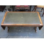 REPRODUCTION COFFEE TABLE WITH GREEN LEATHER INSERTS