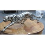 LARGE DECORATIVE WHITE METAL FIGURE OF A PROWLING CHEETAH