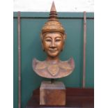 INDIAN STYLE GILDED AND HEAVILY CARVED TREEN BUST ON STAND,